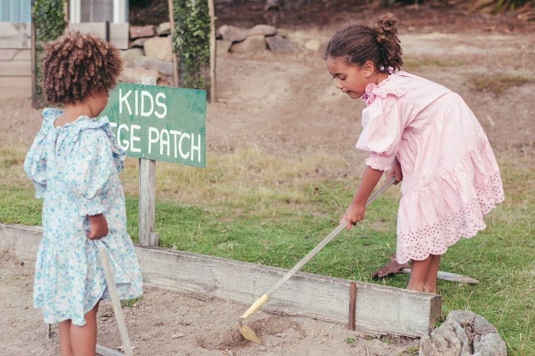 a couple of girls cleaning the ground LOCYhBKrPM0 jpg