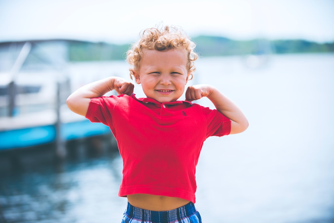 boy standing near dock lVCHfXn3VME jpg